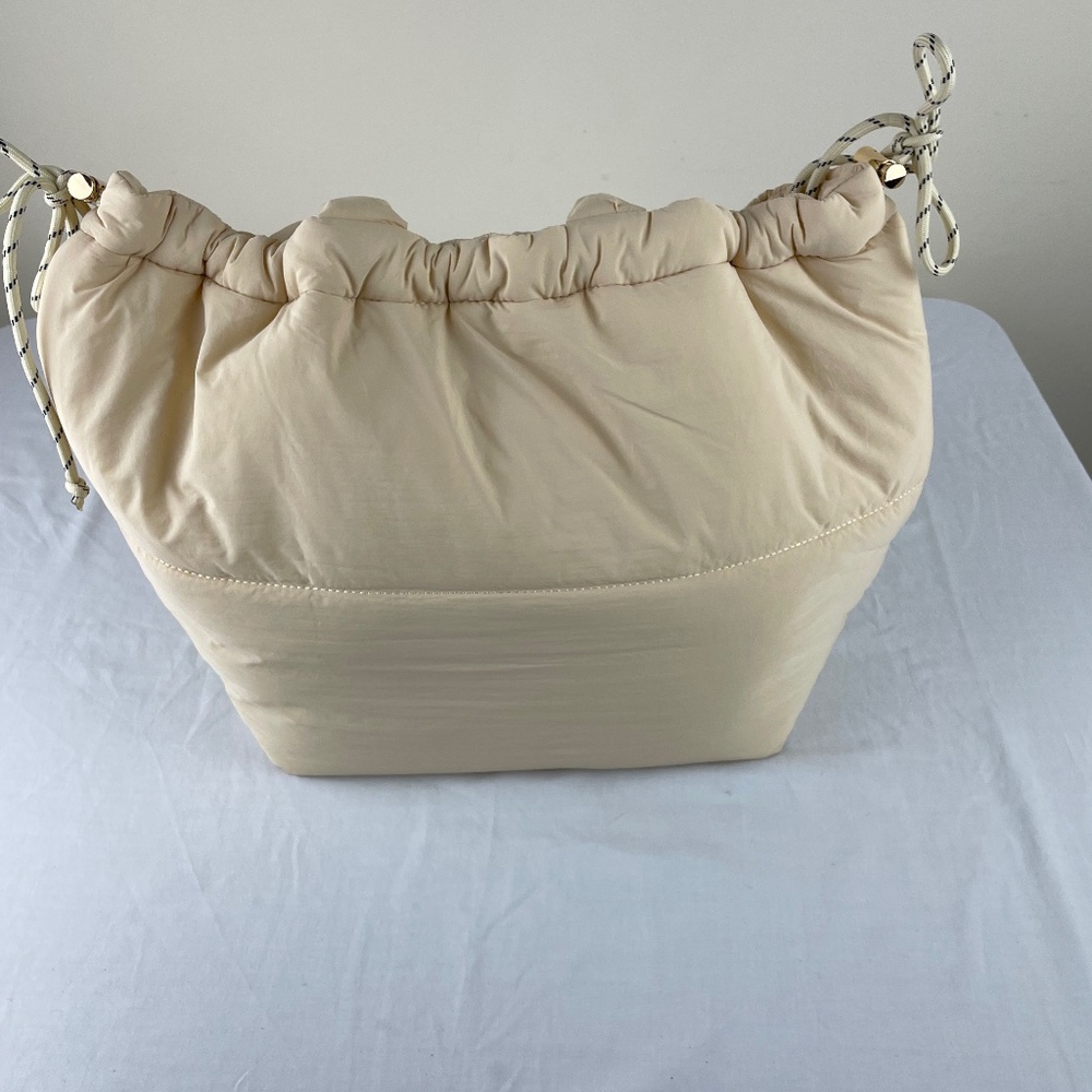 Anthropologie Crème Nylon Drawstring Padded Tote Bag